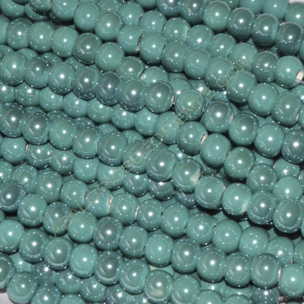 Bola de cerámica titanizada esmeralda de 8 x 8,9 mm.