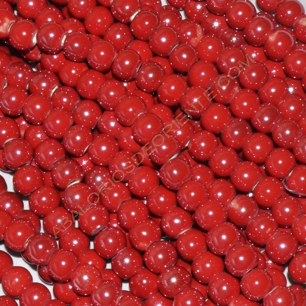 Bola de cerámica titanizada roja de 7 x 8 mm.