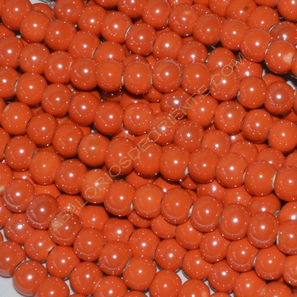 Bola de cerámica titanizada naranja de 8 x 8,9 mm.