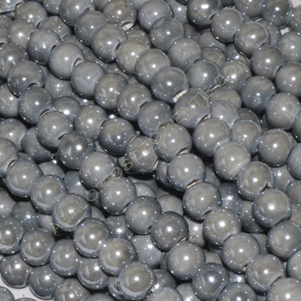 Bola de cerámica titanizada gris de 8 x 8,9 mm.