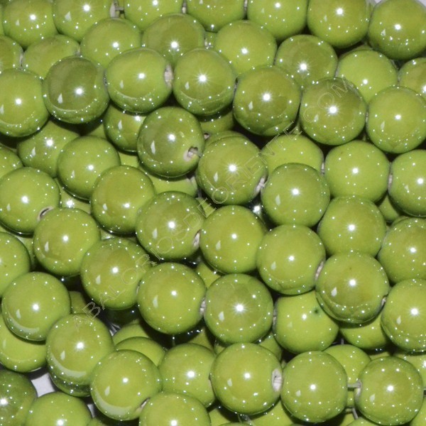 Bola de cerámica titanizada verde de 10 x 10 mm.