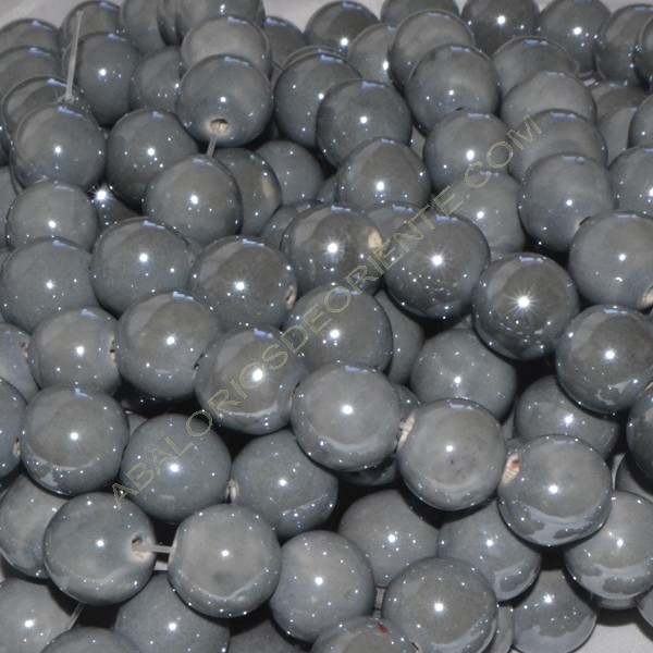 Bola de cerámica titanizada gris de 10 x 10 mm.